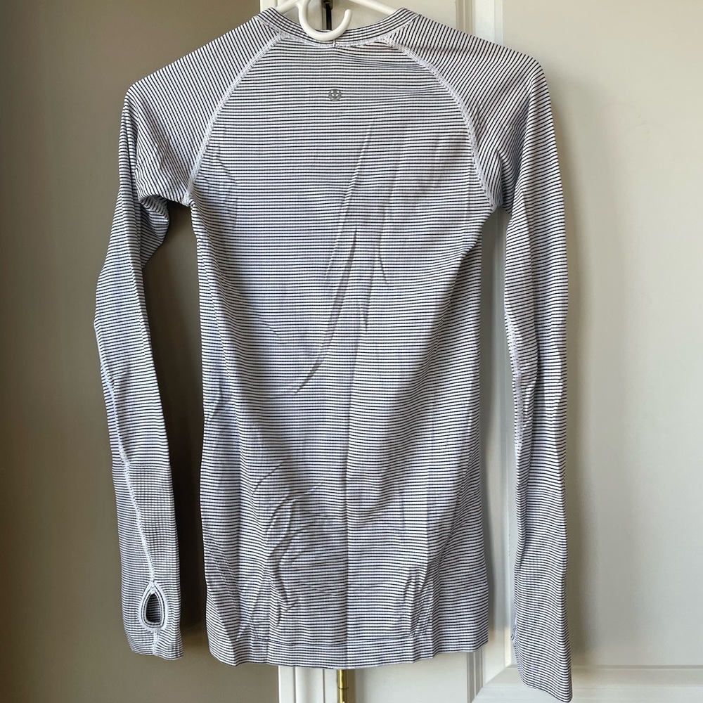 Lululemon long shirt.  The shirts are on the longer side and slim fitting